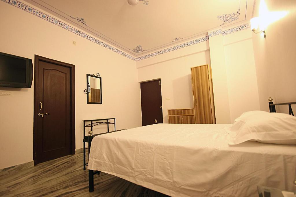 Hotel Devi Palace Udaipur Oda fotoğraf